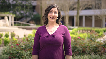 Dr. Casey Colins standing outside discussing nutrition