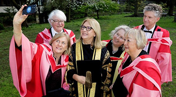 Soderberg (taking selfie) and Trinity College honors recipients, photo credit from Trinity College