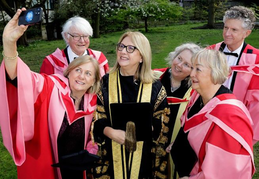 Soderberg (taking selfie) and Trinity College honors recipients, photo credit from Trinity College