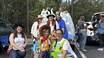 Trunk and Treat Marketing and Communications Team as Toys Story