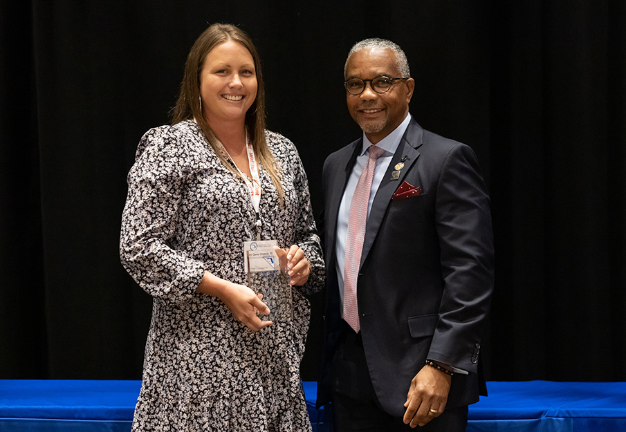 Young Engineer of the Year Award winner, Corey Chascin, holding her award