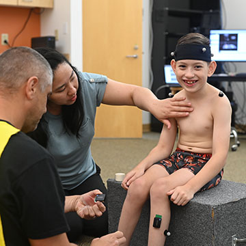 Finn Valentin participating in a power mobility clinical trial