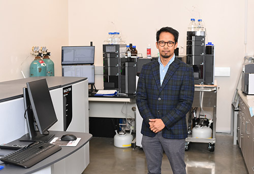 Dr. Florentino De la Cruz, UNF assistant professor of civil engineering, in his research lab