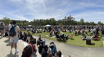 People gathered at UNF campus to view total eclipse