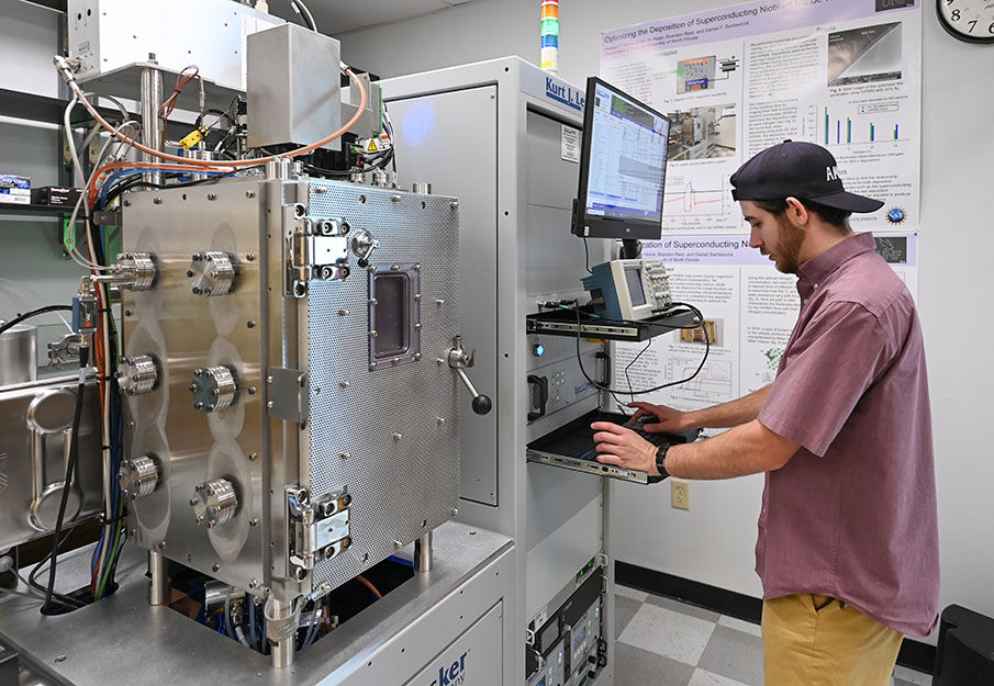 Hudson Horne working on a machine