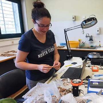 Dr. Jacqueline Meier analyzing bones