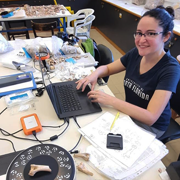 Dr. Jacqueline Meier working on bones