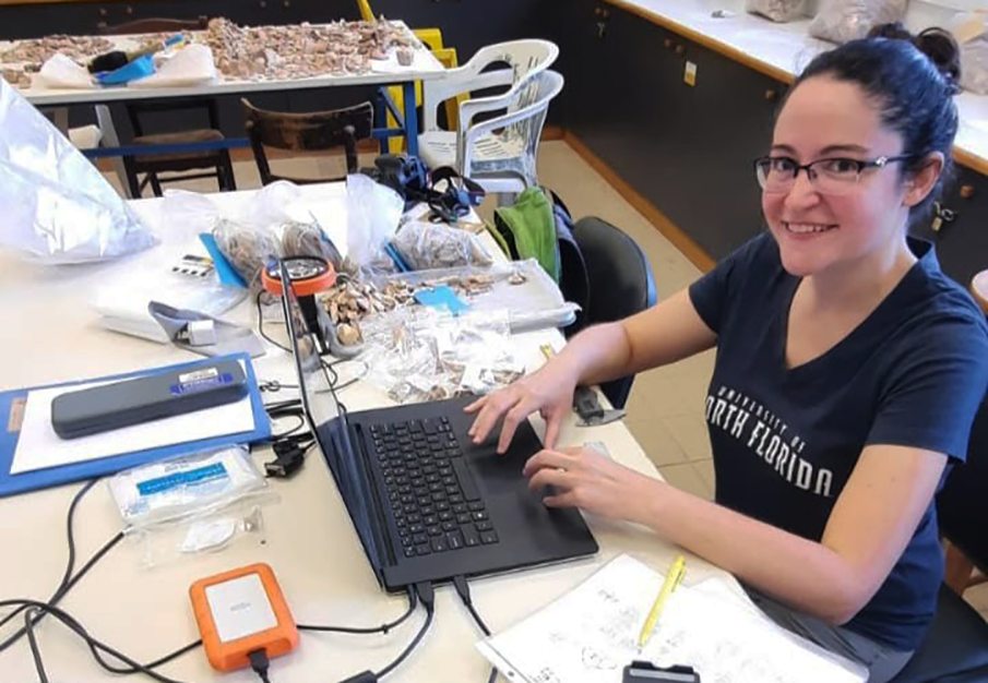 Dr. Jacqueline Meier working on bones