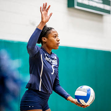 Mahalia White playing volleyball