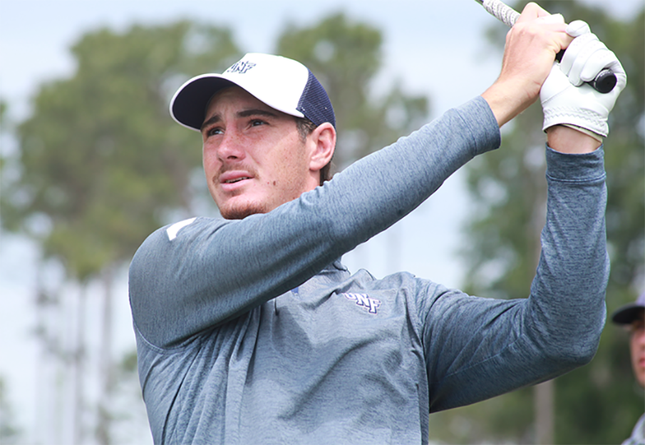 Nick Gabrelcik swinging a golf club, photo from ASUN 