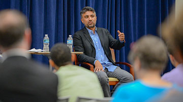 Rohan Patel speaking at the "Powering the Future" public policy event