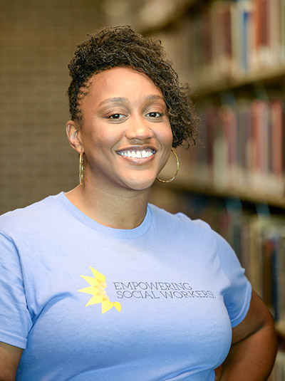 UNF student Teleauba Revels inside the UNF library