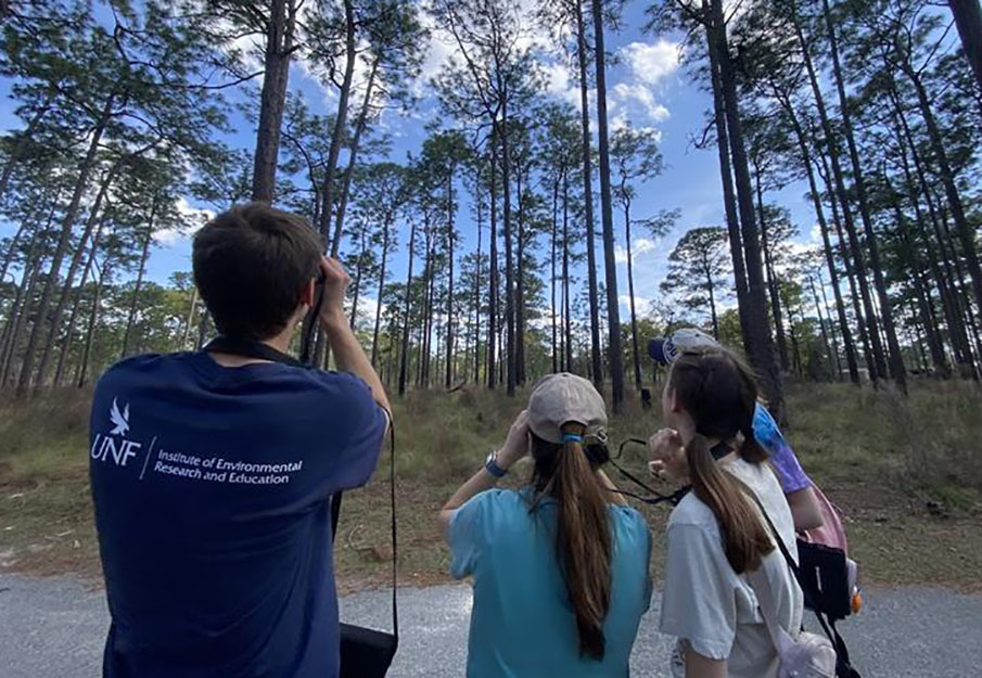 Four IERE faculty in nature