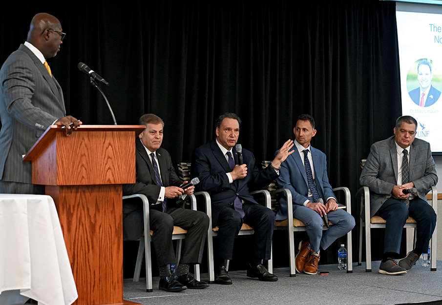 UNF President Limayem speaking at JAXUSA panel event