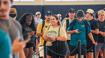 UNF students waiting in line in the UNF Field House