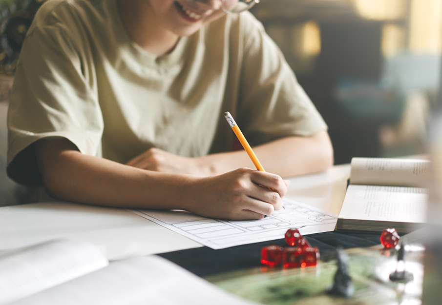 AdobeStock image of someone playing a table top game