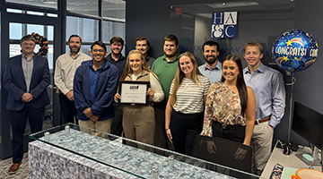 Abraham Ovalle at Hancock Askew with company employees