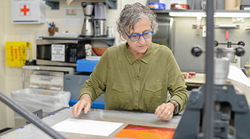 Sheila Goloborotko working on a new print design