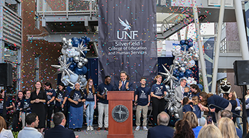 Silverfield College of Education and Human Services announcement with confetti