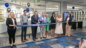 Ribbon cutting at the Allen Lastinger Center event