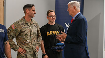 William Harrell speaking to army members
