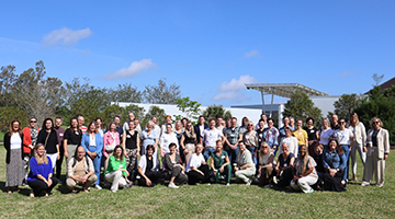 Visiting dutch educators standing with School of Education faculty