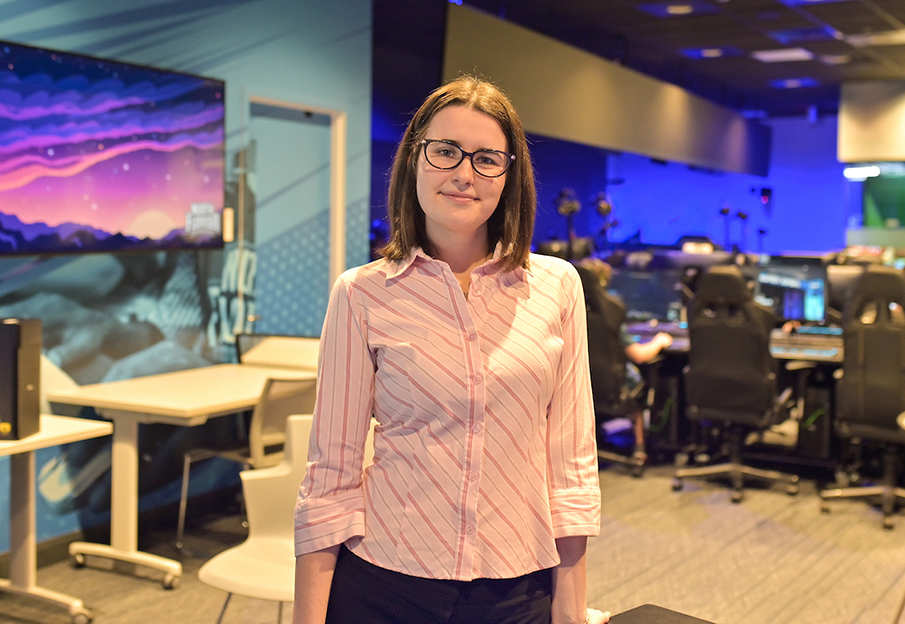 Claire Campo standing in front of Esports arena