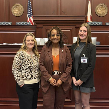 Audrey McGrath standing standing in Florida representatives room