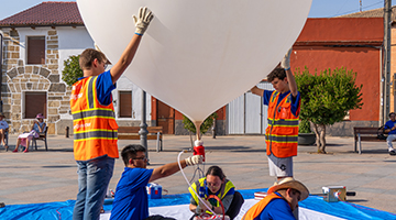 Team of UNF students setting up a balloon in Spain