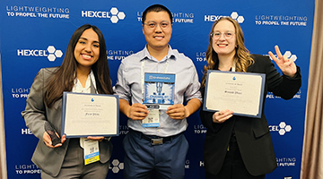 Dr. Longfei Zhou, Maria Fernanda Ocrospoma Figueroa and Tessa Baur holding their awards from the Additive Manufacturing Competition