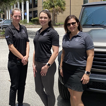 Racquel Rowell with her Mercedes coworkers