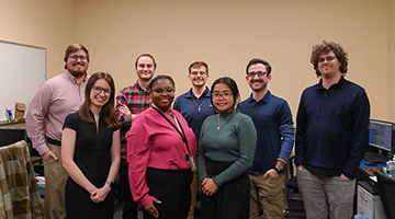 The Security Operations Center Staff standing together