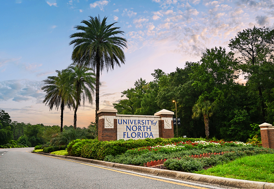 UNF entrance sign with beautiful sky
