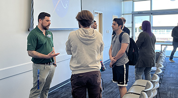 UNF alum Joseph Maldonado talking to students