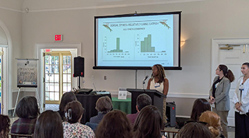 Alexis McEwan presenting her research