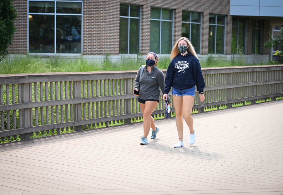 Students walking on boardwalk