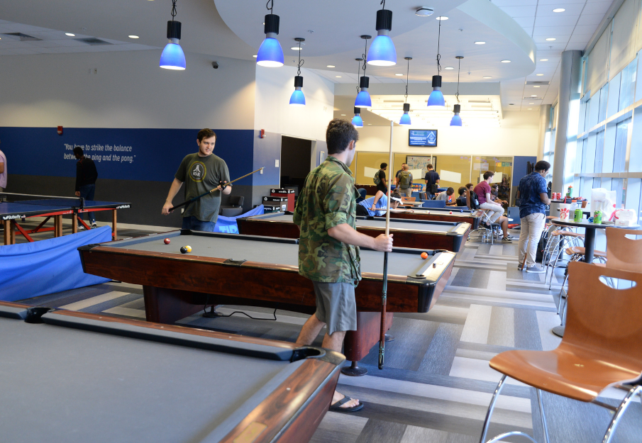 UNF Game Room with students playing pool