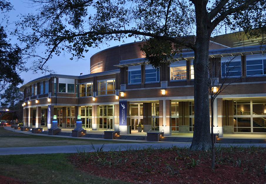 Outside view of the Fine Arts Center at night