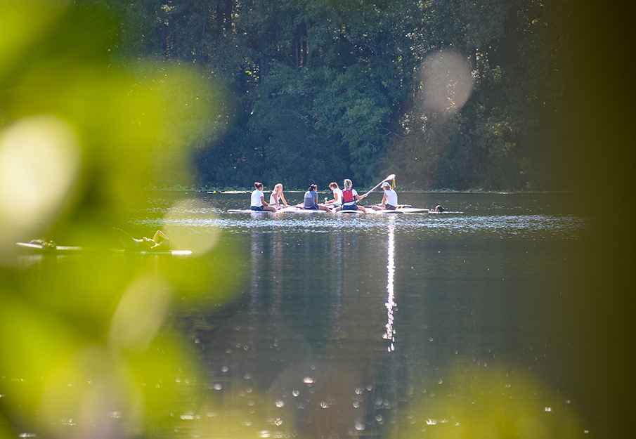 Students canoeing in lake