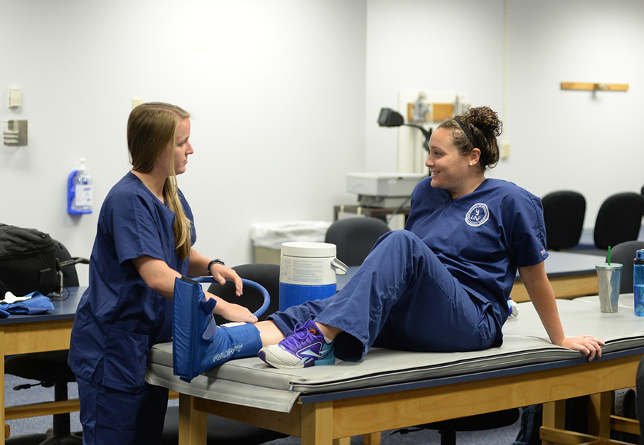 Physical therapy students in lab