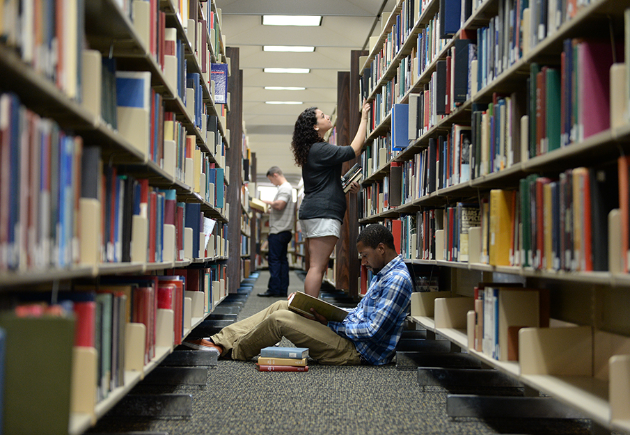 Students studying in library