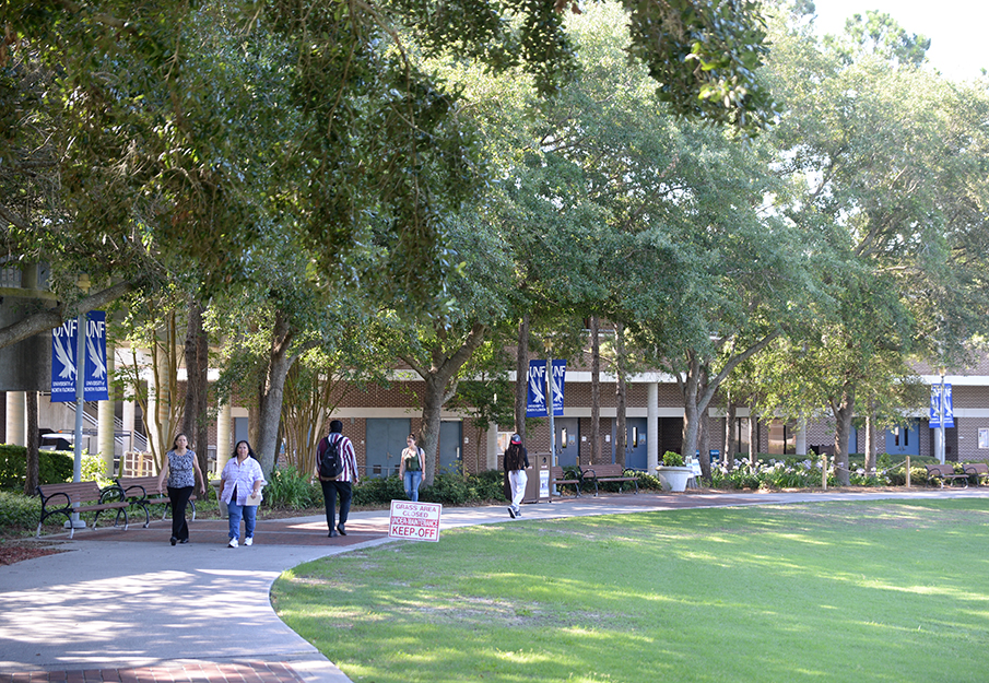 Students walking on the green