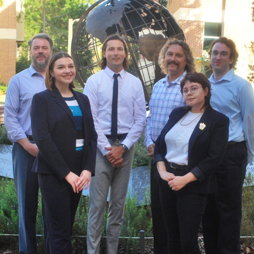 Mike Binder with group of research members