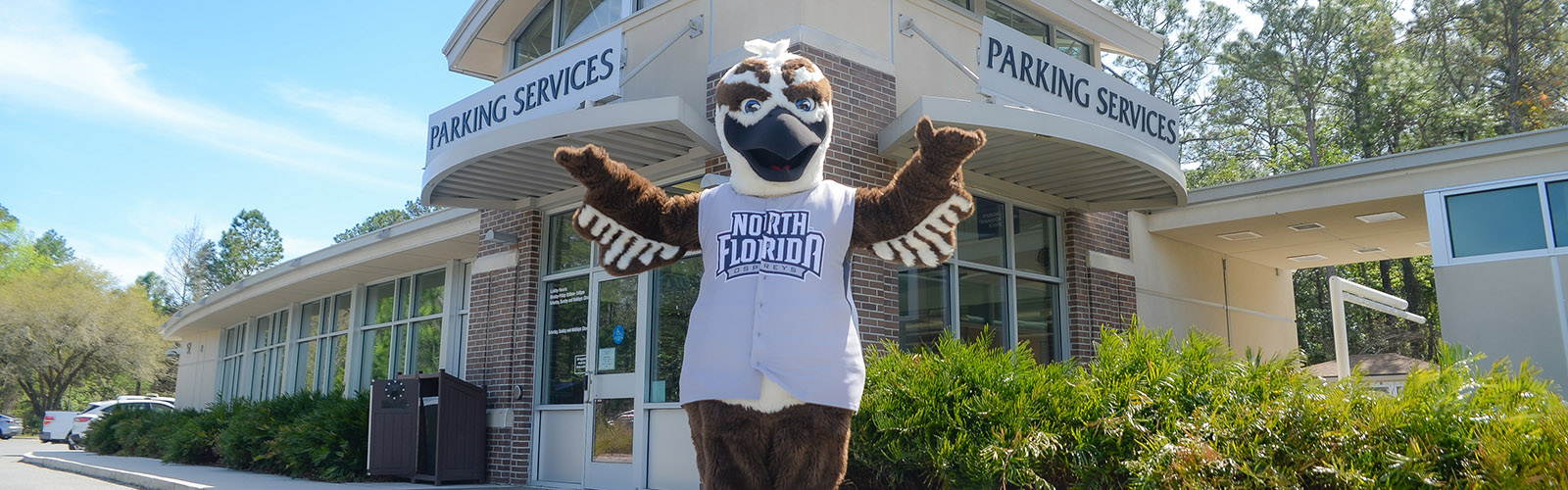 Ozzie outside of the Parking Services building