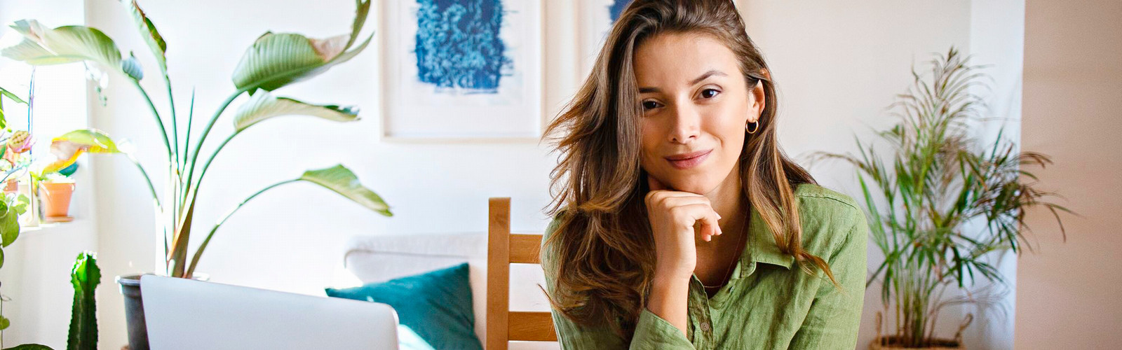 Smiling woman with laptop