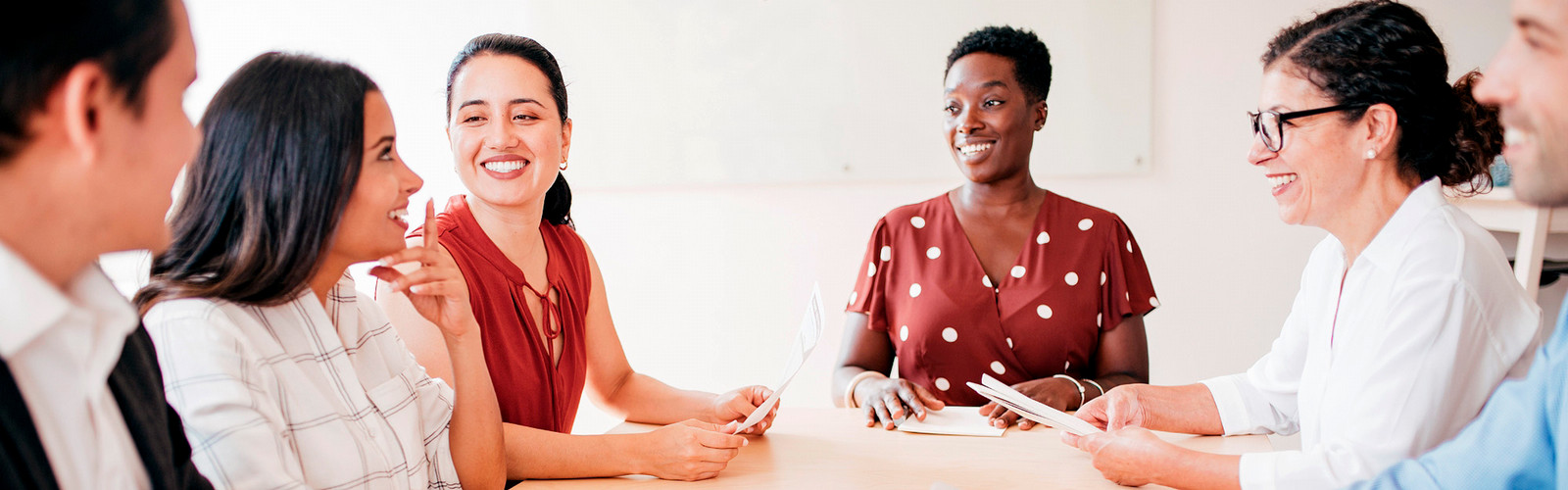 Happy health employees in a meeting