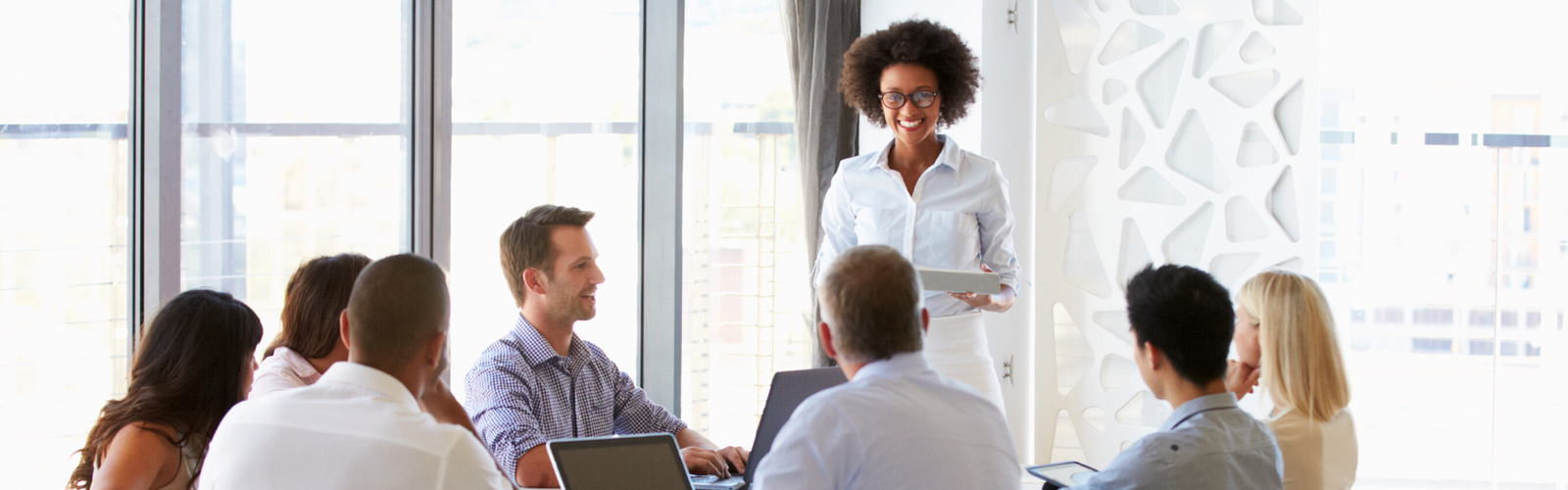 Woman Taking a Leadership at a Meeting
