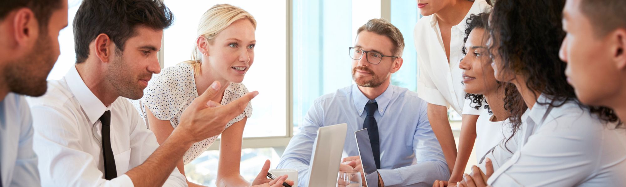 Female manager talking to her team