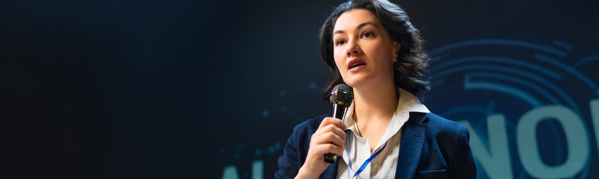 Female keynote speaker at an event
