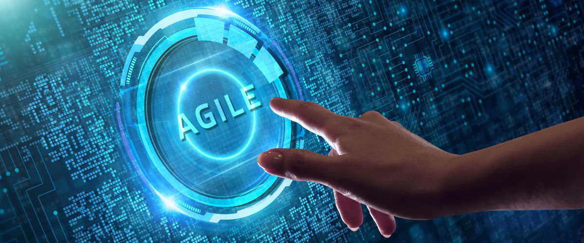Agile on a technical blue background with a hand touching the screen